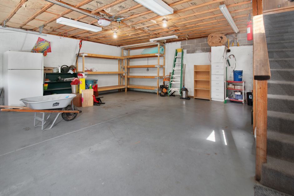 Clean, finished garage floor with a glossy coated concrete surface