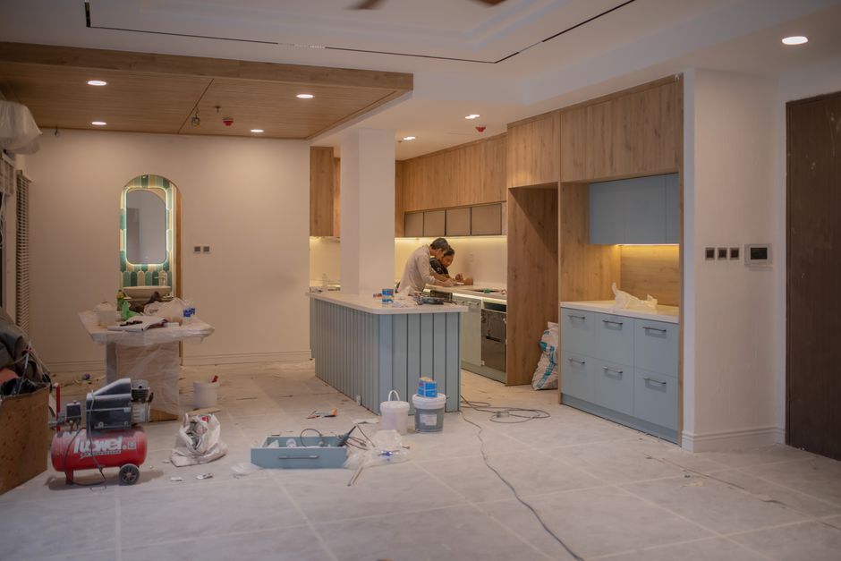 Painted kitchen cabinets in a bright residential kitchen with natural light