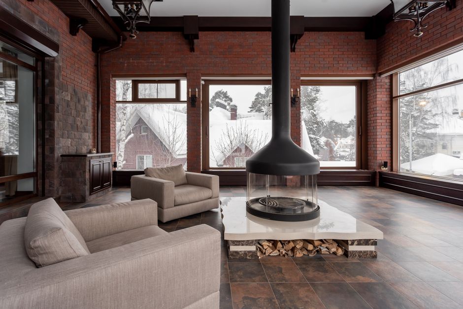 A freshly painted living room with soft winter light coming through the windows